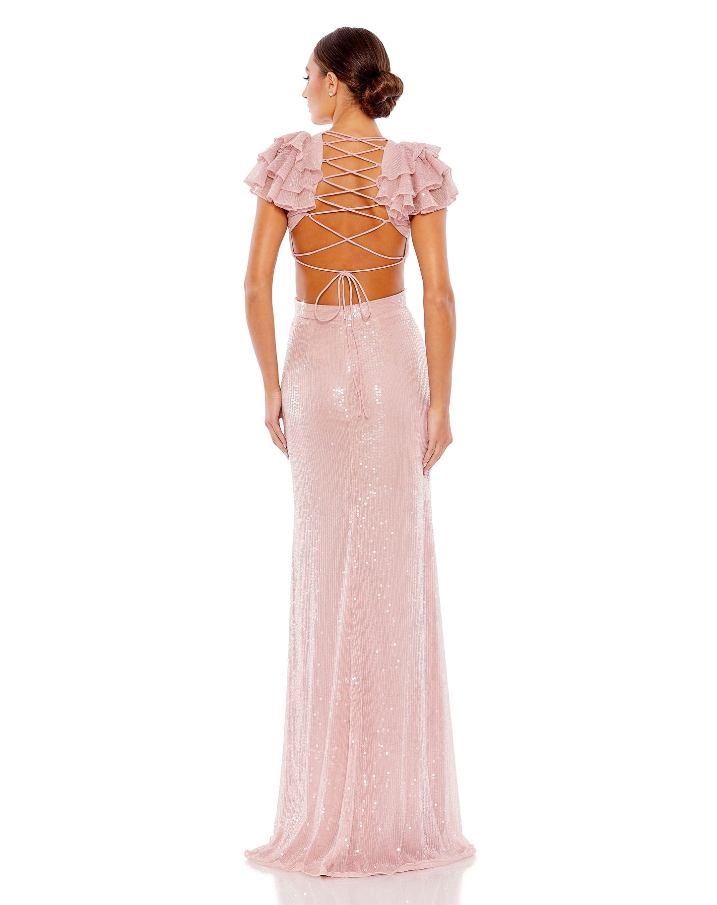 The back view of a woman wearing a Mac Duggal 10829 Long Ruffle Sleeve Formal Dress in pink sequins.