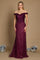 A formal mermaid fitted evening dress in a rich eggplant hue, featuring a sleek silhouette that accentuates the curves, with elegant detailing and a flowing train.