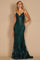 A stunning emerald green fitted corset long formal prom dress, featuring intricate detailing and a flowing skirt that elegantly cascades to the floor.