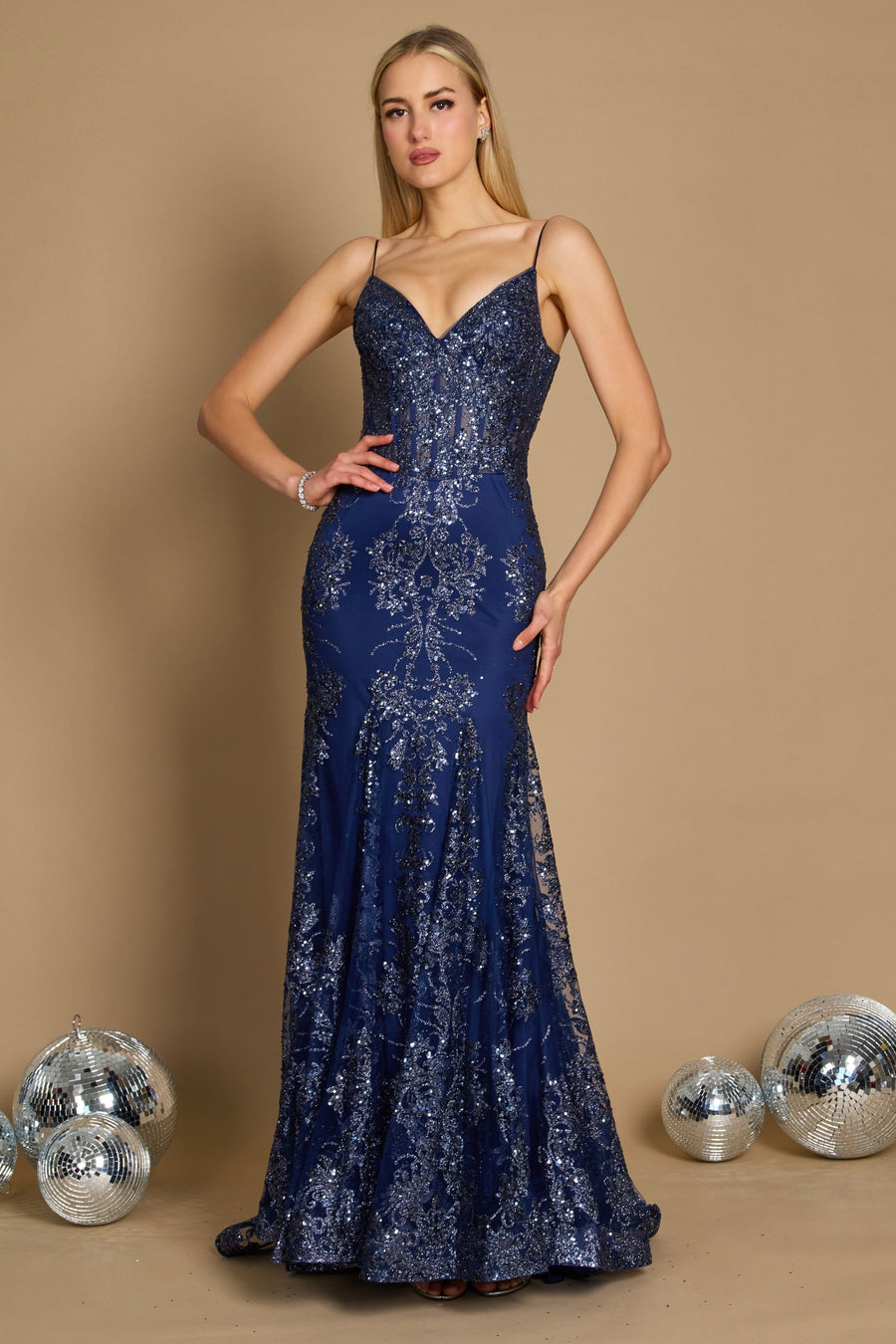 A stunning navy fitted corset long formal prom dress, featuring intricate detailing and a flattering silhouette, perfect for an elegant evening event.