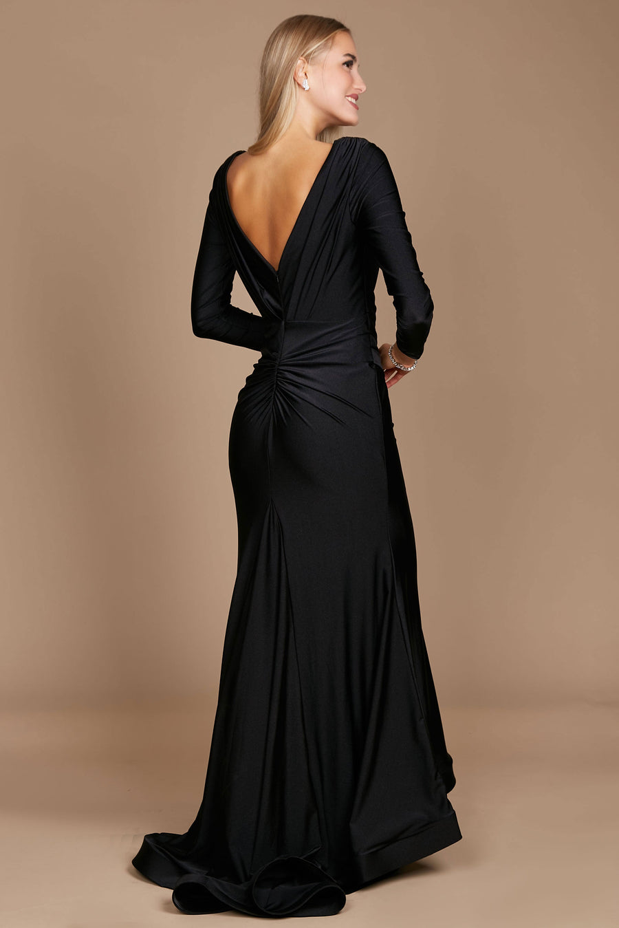 A sleek black long sleeve formal evening dress, elegantly fitted to accentuate the silhouette, featuring a sophisticated neckline and flowing fabric that cascades to the floor.