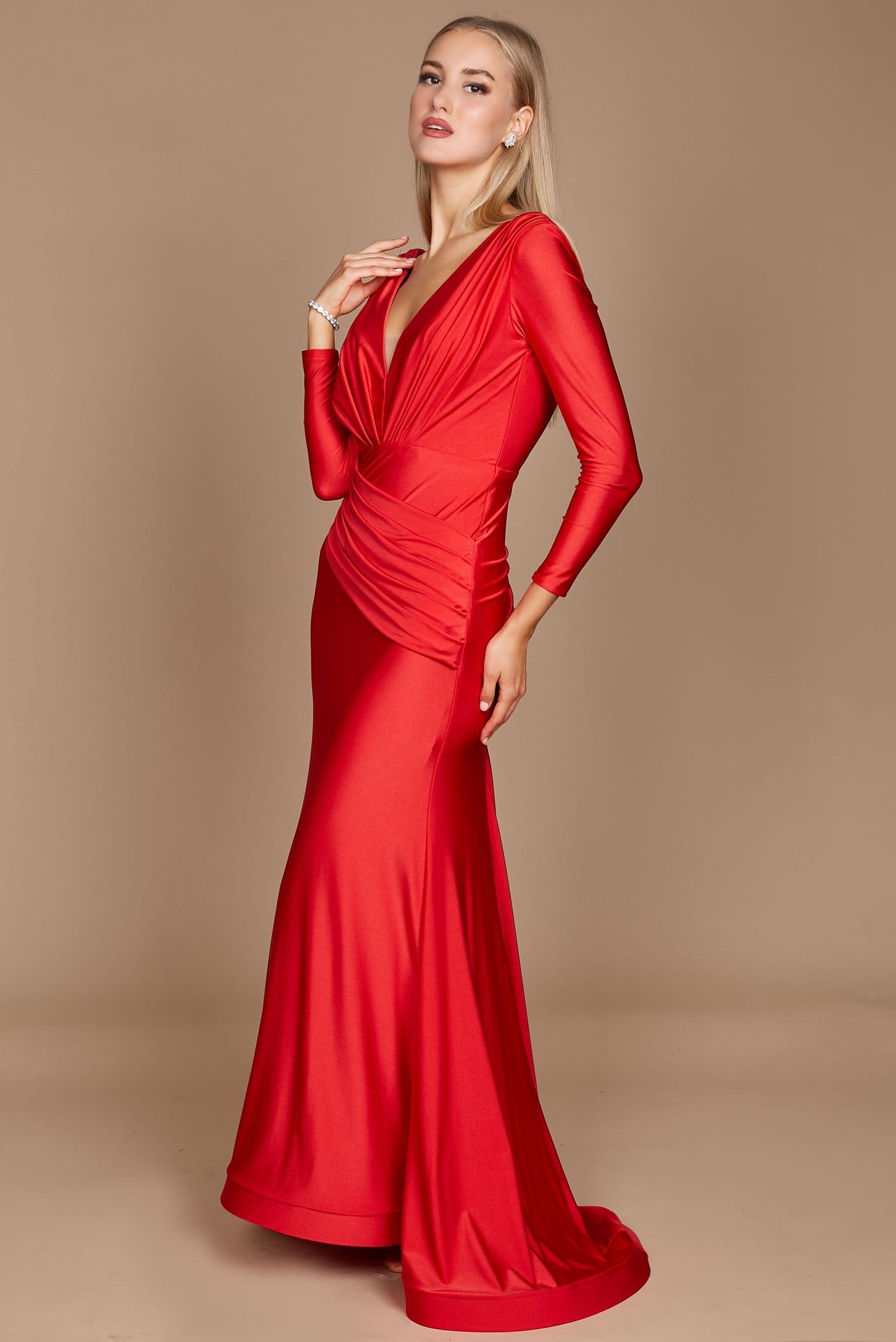 A stunning long sleeve formal fitted evening dress in vibrant red, elegantly tailored to accentuate the silhouette, featuring a sophisticated neckline and flowing fabric that cascades gracefully to the floor.