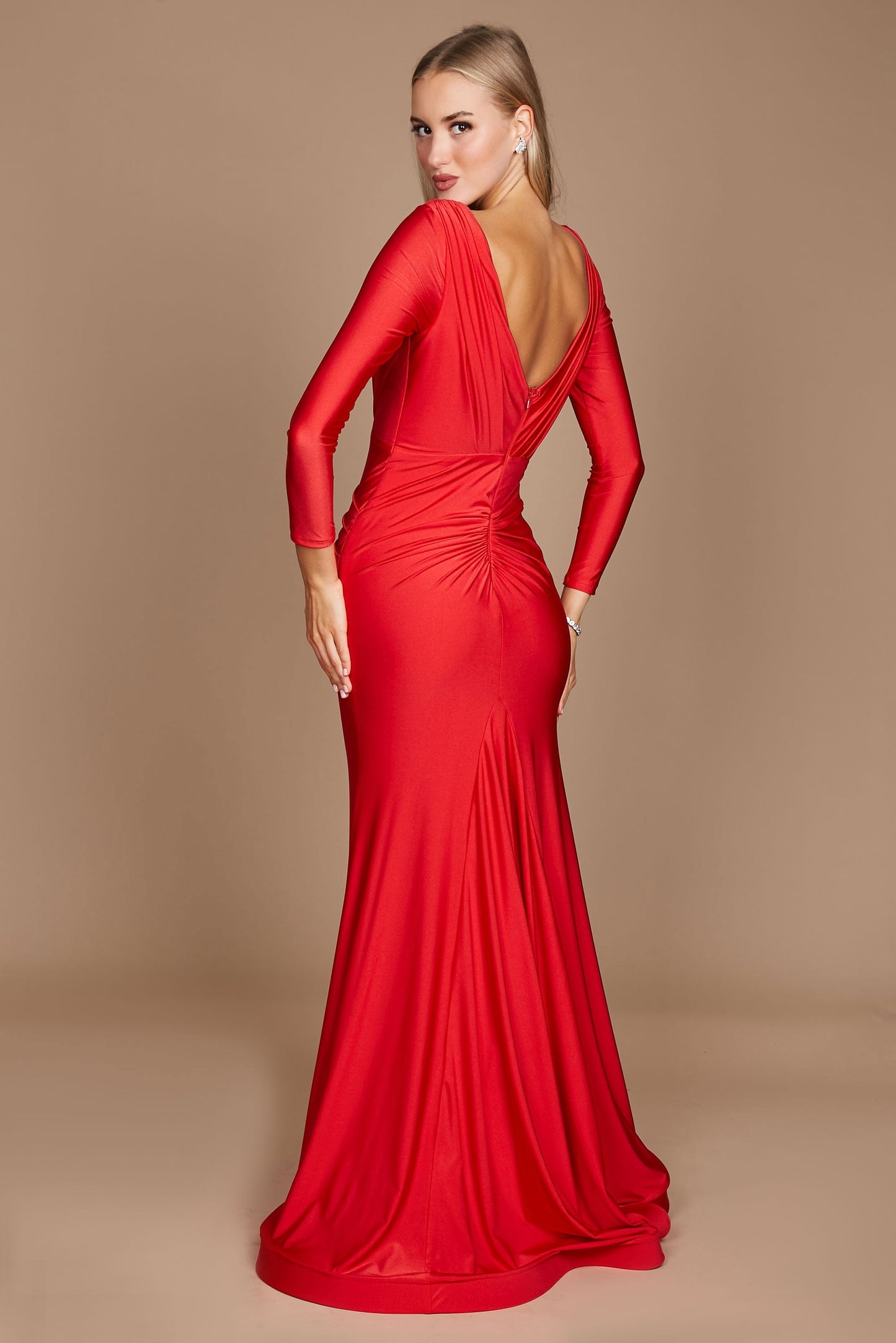 A stunning long sleeve formal fitted evening dress in vibrant red, elegantly tailored to accentuate the silhouette, featuring a sophisticated neckline and flowing fabric that cascades gracefully to the floor.