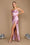 A stunning mauve prom dress featuring a draped corset design and a flowing cowl neckline, elegantly cascading to the floor.