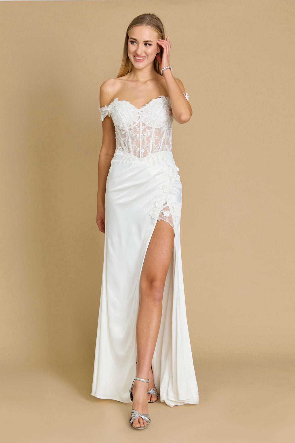 A stunning ivory off-the-shoulder formal prom dress featuring a fitted corset bodice, elegantly accentuating the waist and creating a sophisticated silhouette.