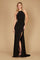 A sleek black prom dress featuring a long, fitted silhouette with an elegant open back design, showcasing a blend of sophistication and modern style.