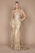 A stunning gold fitted corset long formal prom dress, elegantly designed with intricate detailing and a flowing skirt, perfect for a glamorous evening event.